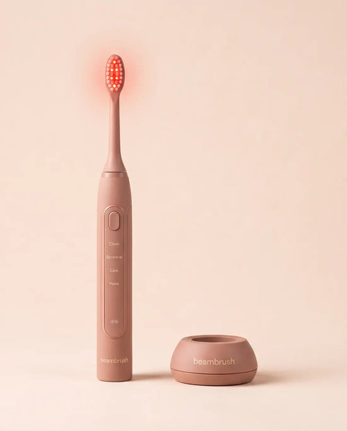 BeamBrush — red and near-infrared light toothbrush, handle and charging base
